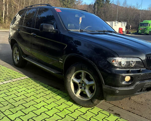 Черный БМВ Х5, объемом двигателя 4.4 л и пробегом 333 тыс. км за 9999 $, фото 10 на Automoto.ua