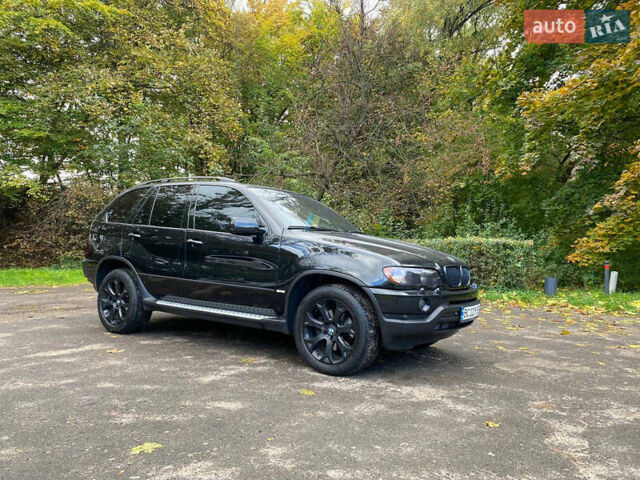 Черный БМВ Х5, объемом двигателя 2.93 л и пробегом 330 тыс. км за 10500 $, фото 4 на Automoto.ua