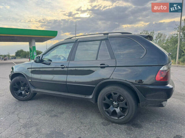Чорний БМВ Х5, об'ємом двигуна 3 л та пробігом 400 тис. км за 8500 $, фото 2 на Automoto.ua