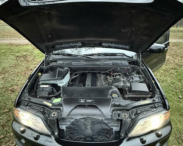 Черный БМВ Х5, объемом двигателя 2.98 л и пробегом 404 тыс. км за 9500 $, фото 9 на Automoto.ua