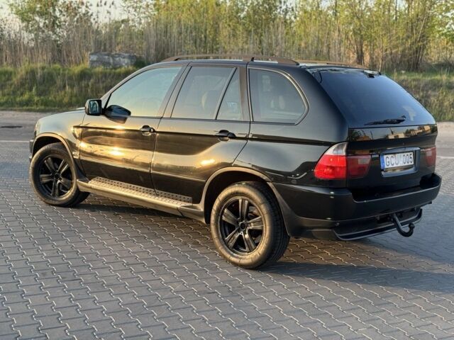 Чорний БМВ Х5, об'ємом двигуна 3 л та пробігом 365 тис. км за 4999 $, фото 5 на Automoto.ua