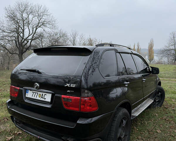 Черный БМВ Х5, объемом двигателя 2.98 л и пробегом 404 тыс. км за 9500 $, фото 2 на Automoto.ua