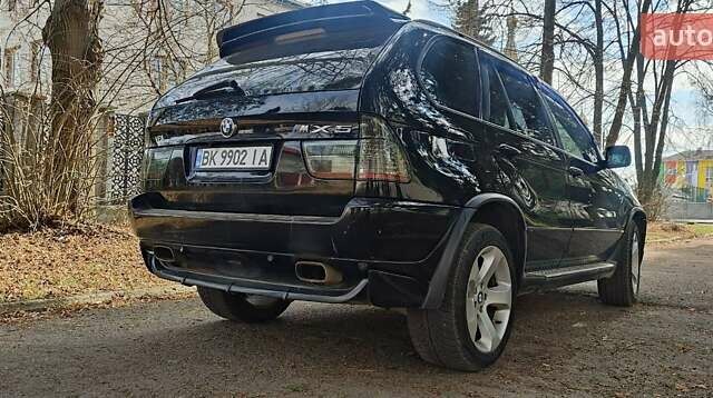 Черный БМВ Х5, объемом двигателя 4.4 л и пробегом 370 тыс. км за 5900 $, фото 11 на Automoto.ua