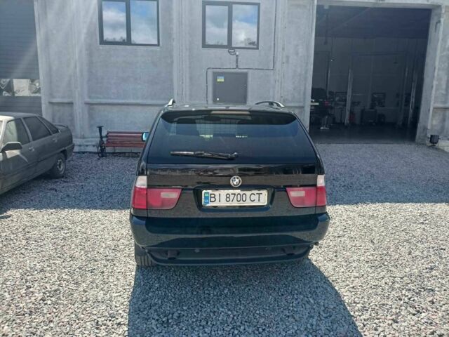 Черный БМВ Х5, объемом двигателя 3 л и пробегом 3 тыс. км за 7000 $, фото 2 на Automoto.ua