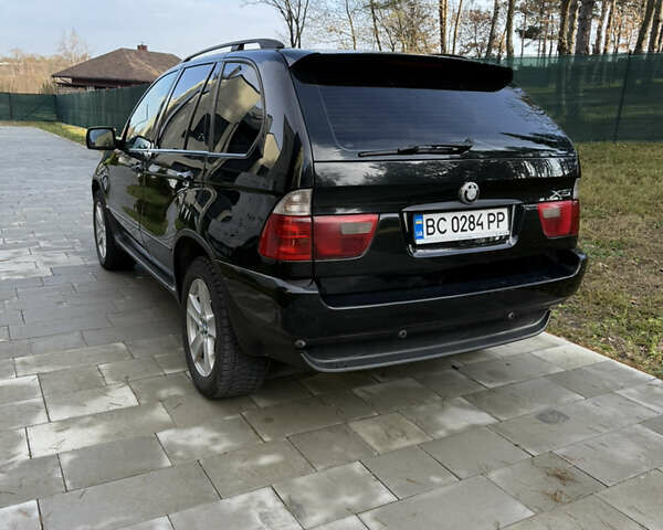 Чорний БМВ Х5, об'ємом двигуна 2.93 л та пробігом 391 тис. км за 7950 $, фото 3 на Automoto.ua