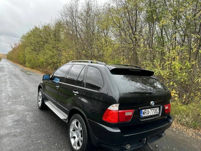 Черный БМВ Х5, объемом двигателя 3 л и пробегом 430 тыс. км за 6500 $, фото 4 на Automoto.ua