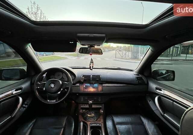 Черный БМВ Х5, объемом двигателя 4.4 л и пробегом 295 тыс. км за 8000 $, фото 6 на Automoto.ua