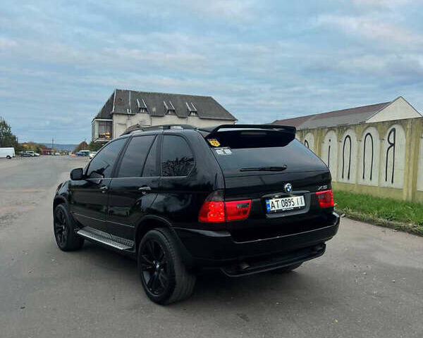 Чорний БМВ Х5, об'ємом двигуна 3 л та пробігом 384 тис. км за 9300 $, фото 7 на Automoto.ua