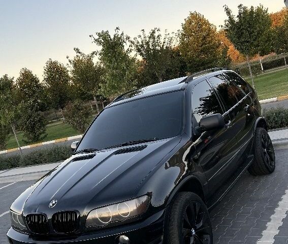 Черный БМВ Х5, объемом двигателя 4.4 л и пробегом 295 тыс. км за 7000 $, фото 2 на Automoto.ua