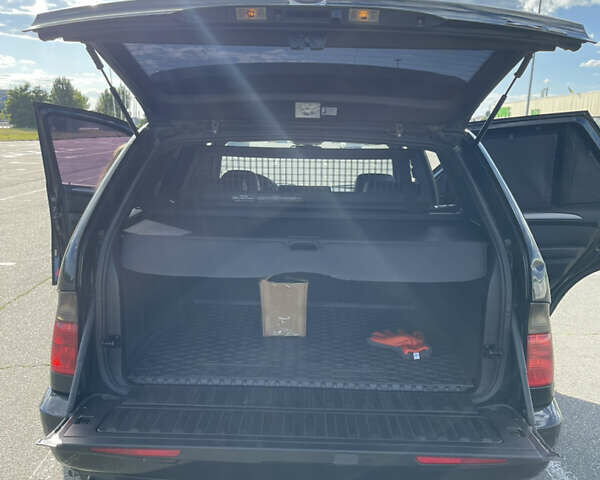 Чорний БМВ Х5, об'ємом двигуна 3 л та пробігом 430 тис. км за 11000 $, фото 13 на Automoto.ua