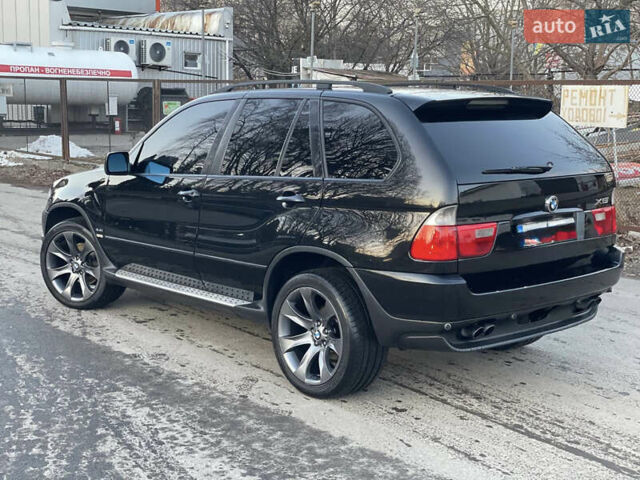 Черный БМВ Х5, объемом двигателя 4.4 л и пробегом 333 тыс. км за 9999 $, фото 29 на Automoto.ua