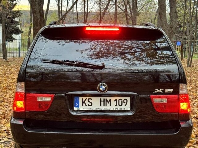 Черный БМВ Х5, объемом двигателя 3 л и пробегом 238 тыс. км за 5500 $, фото 4 на Automoto.ua