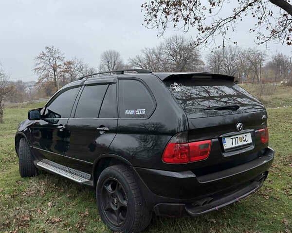 Черный БМВ Х5, объемом двигателя 2.98 л и пробегом 404 тыс. км за 9500 $, фото 4 на Automoto.ua