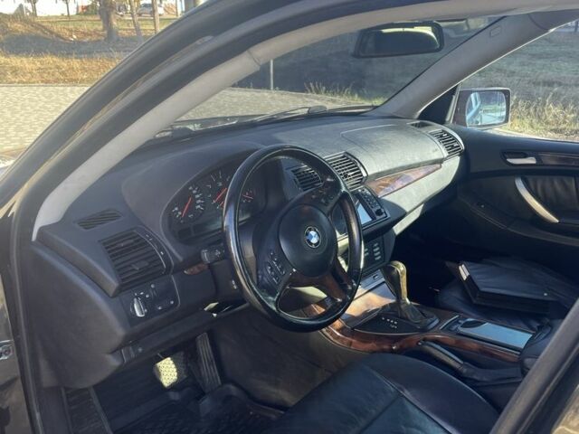 Черный БМВ Х5, объемом двигателя 3 л и пробегом 300 тыс. км за 8900 $, фото 4 на Automoto.ua
