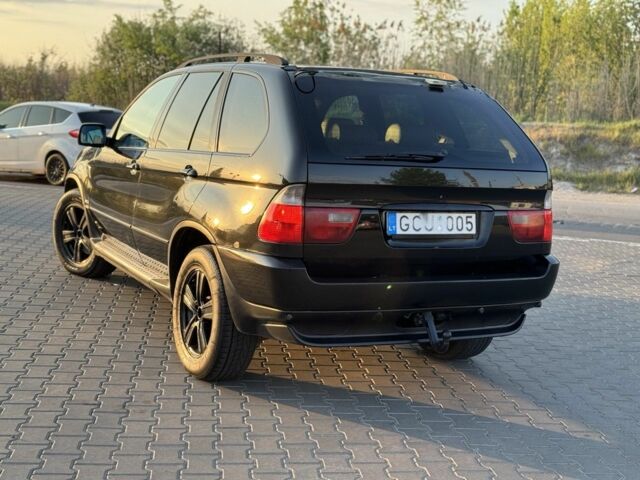 Чорний БМВ Х5, об'ємом двигуна 3 л та пробігом 365 тис. км за 4999 $, фото 4 на Automoto.ua