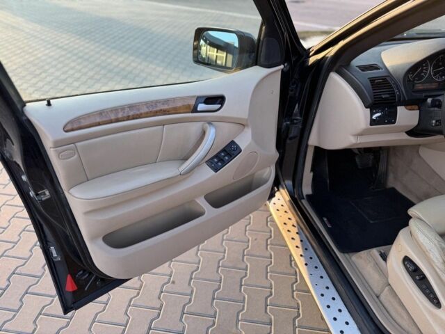 Чорний БМВ Х5, об'ємом двигуна 3 л та пробігом 365 тис. км за 4999 $, фото 12 на Automoto.ua