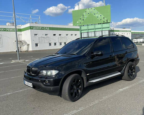 Чорний БМВ Х5, об'ємом двигуна 3 л та пробігом 430 тис. км за 11000 $, фото 3 на Automoto.ua