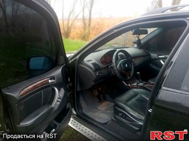 Черный БМВ Х5, объемом двигателя 4.4 л и пробегом 276 тыс. км за 9200 $, фото 3 на Automoto.ua