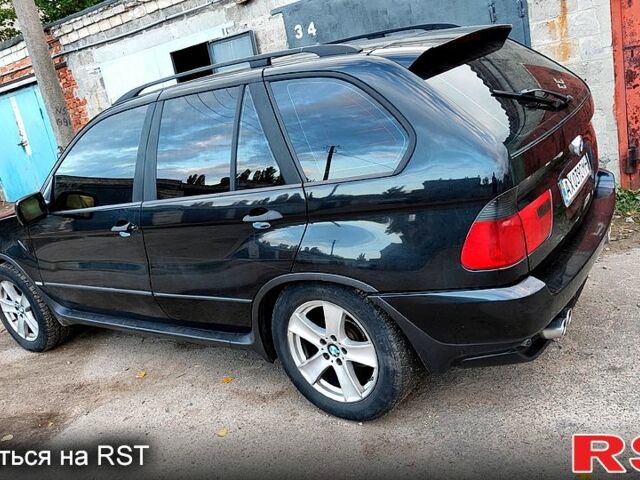 Черный БМВ Х5, объемом двигателя 2.9 л и пробегом 200 тыс. км за 8000 $, фото 5 на Automoto.ua