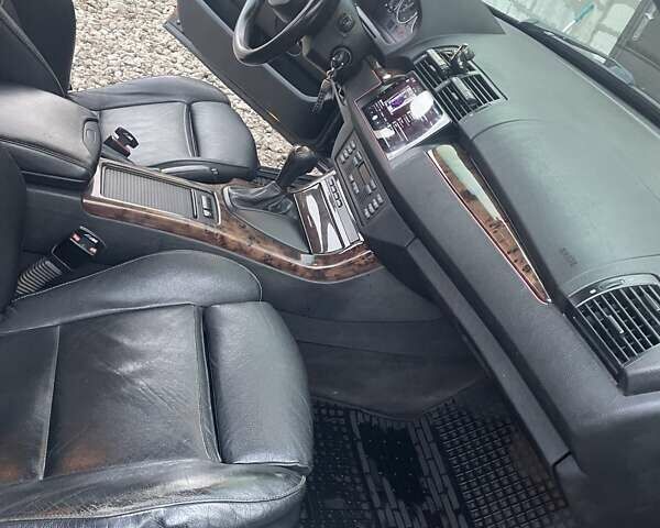 Черный БМВ Х5, объемом двигателя 3 л и пробегом 378 тыс. км за 12000 $, фото 13 на Automoto.ua