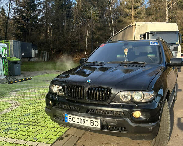 Черный БМВ Х5, объемом двигателя 4.4 л и пробегом 333 тыс. км за 9999 $, фото 1 на Automoto.ua