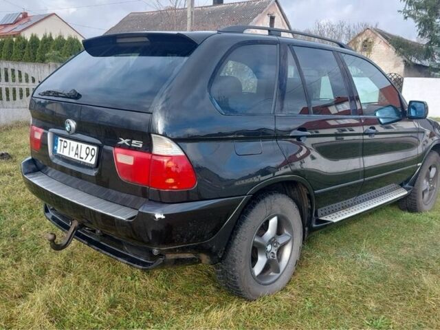 Черный БМВ Х5, объемом двигателя 3 л и пробегом 280 тыс. км за 4500 $, фото 1 на Automoto.ua