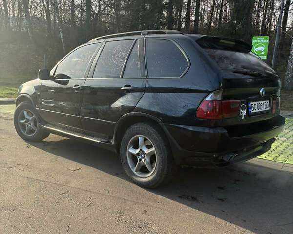 Черный БМВ Х5, объемом двигателя 4.4 л и пробегом 333 тыс. км за 9999 $, фото 5 на Automoto.ua