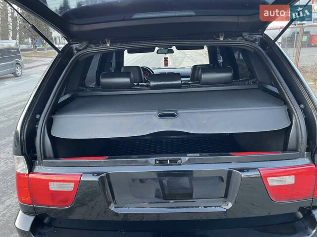 Черный БМВ Х5, объемом двигателя 4.4 л и пробегом 333 тыс. км за 9999 $, фото 25 на Automoto.ua