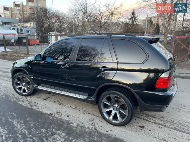 Черный БМВ Х5, объемом двигателя 4.4 л и пробегом 333 тыс. км за 9999 $, фото 23 на Automoto.ua