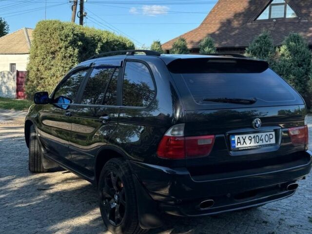 Черный БМВ Х5, объемом двигателя 3 л и пробегом 420 тыс. км за 7000 $, фото 1 на Automoto.ua