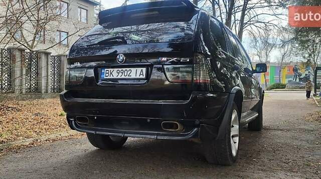 Черный БМВ Х5, объемом двигателя 4.4 л и пробегом 370 тыс. км за 5900 $, фото 12 на Automoto.ua