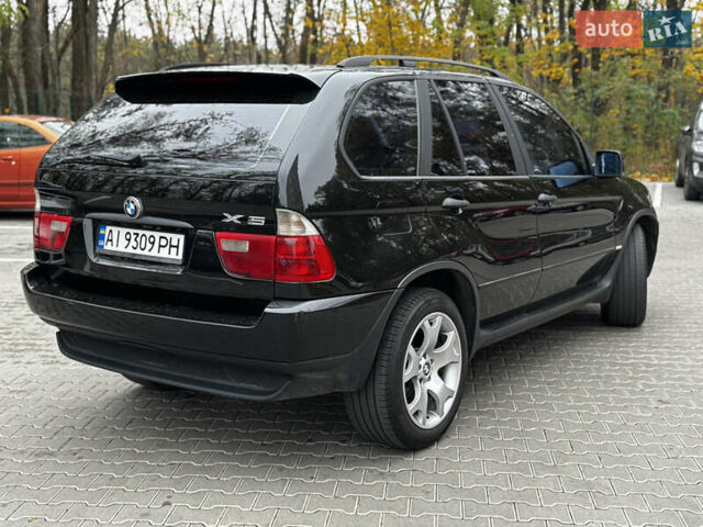 Черный БМВ Х5, объемом двигателя 3 л и пробегом 441 тыс. км за 9200 $, фото 5 на Automoto.ua