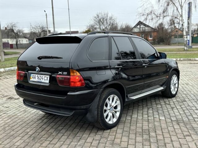 Чорний БМВ Х5, об'ємом двигуна 3 л та пробігом 374 тис. км за 9800 $, фото 4 на Automoto.ua