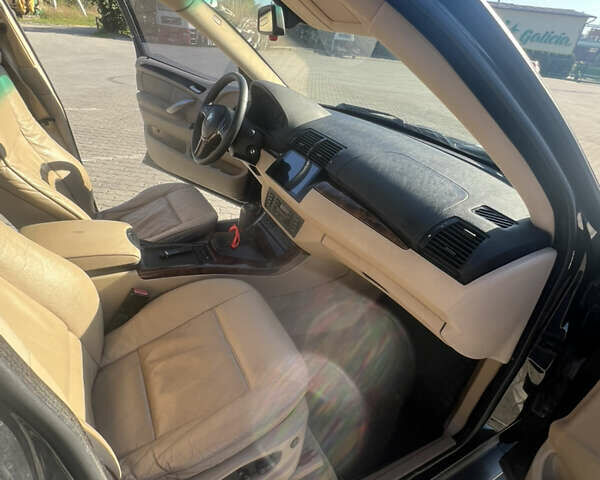 Черный БМВ Х5, объемом двигателя 3 л и пробегом 353 тыс. км за 10500 $, фото 4 на Automoto.ua