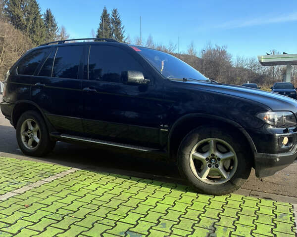 Черный БМВ Х5, объемом двигателя 4.4 л и пробегом 333 тыс. км за 9999 $, фото 9 на Automoto.ua