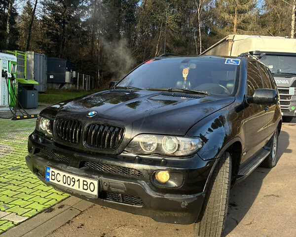 Черный БМВ Х5, объемом двигателя 4.4 л и пробегом 333 тыс. км за 9999 $, фото 2 на Automoto.ua