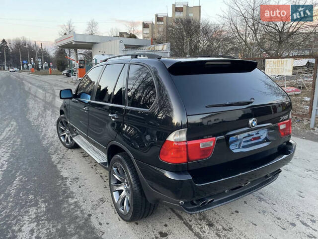 Черный БМВ Х5, объемом двигателя 4.4 л и пробегом 333 тыс. км за 9999 $, фото 24 на Automoto.ua