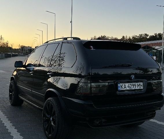 Черный БМВ Х5, объемом двигателя 4.4 л и пробегом 295 тыс. км за 7000 $, фото 5 на Automoto.ua