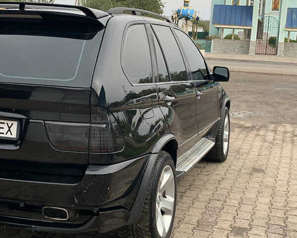 Черный БМВ Х5, объемом двигателя 4.4 л и пробегом 370 тыс. км за 6999 $, фото 5 на Automoto.ua