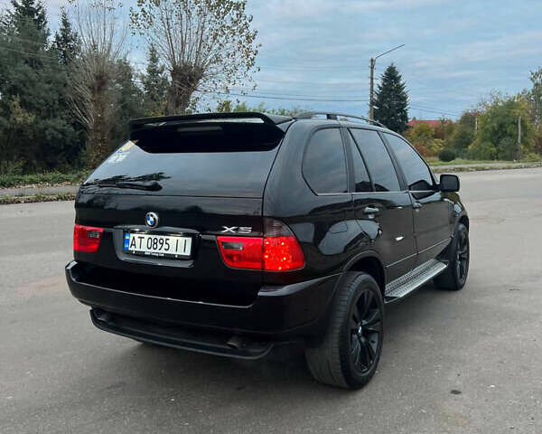 Чорний БМВ Х5, об'ємом двигуна 3 л та пробігом 384 тис. км за 9300 $, фото 4 на Automoto.ua