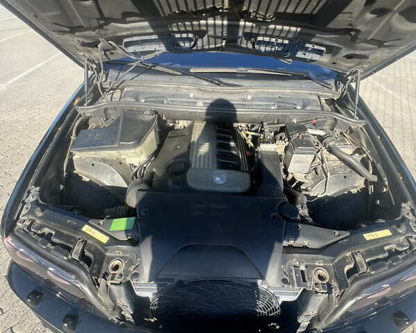 Черный БМВ Х5, объемом двигателя 3 л и пробегом 353 тыс. км за 10500 $, фото 13 на Automoto.ua