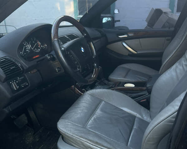 Черный БМВ Х5, объемом двигателя 2.93 л и пробегом 461 тыс. км за 5000 $, фото 5 на Automoto.ua