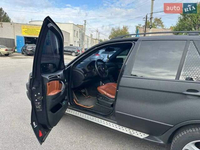 Черный БМВ Х5, объемом двигателя 3 л и пробегом 200 тыс. км за 9900 $, фото 6 на Automoto.ua