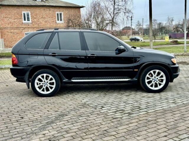 Чорний БМВ Х5, об'ємом двигуна 3 л та пробігом 374 тис. км за 9800 $, фото 3 на Automoto.ua