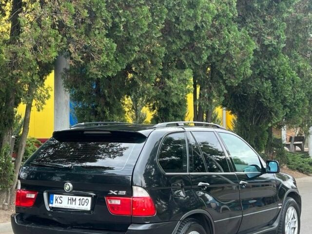 Черный БМВ Х5, объемом двигателя 3 л и пробегом 190 тыс. км за 4570 $, фото 1 на Automoto.ua