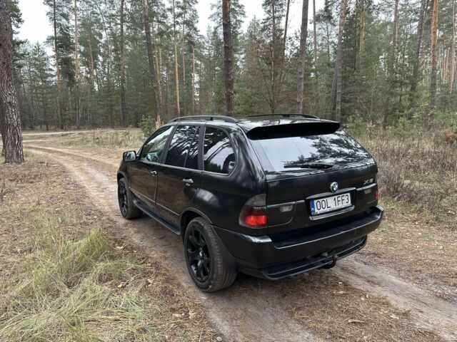 Чорний БМВ Х5, об'ємом двигуна 3 л та пробігом 480 тис. км за 5600 $, фото 4 на Automoto.ua