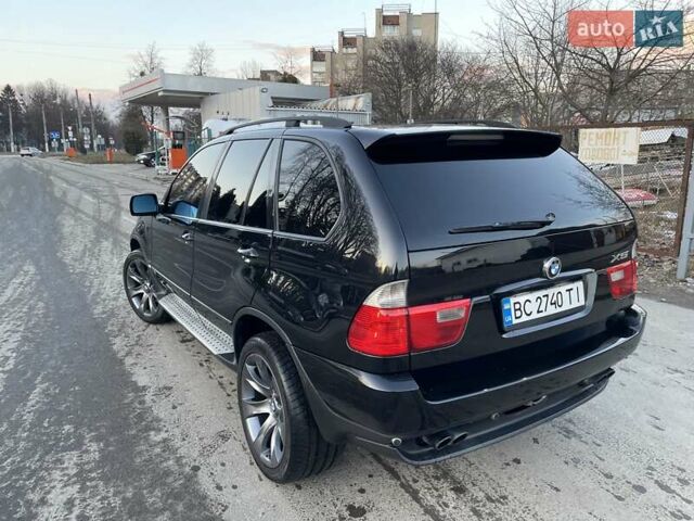 Чорний БМВ Х5, об'ємом двигуна 4.4 л та пробігом 320 тис. км за 9999 $, фото 13 на Automoto.ua