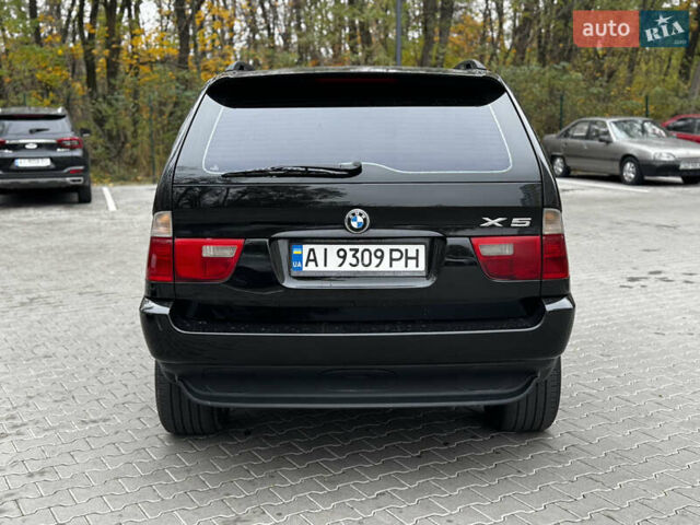 Черный БМВ Х5, объемом двигателя 3 л и пробегом 441 тыс. км за 9200 $, фото 4 на Automoto.ua