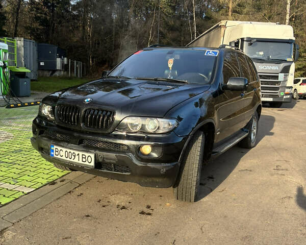 Черный БМВ Х5, объемом двигателя 4.4 л и пробегом 333 тыс. км за 9999 $, фото 3 на Automoto.ua