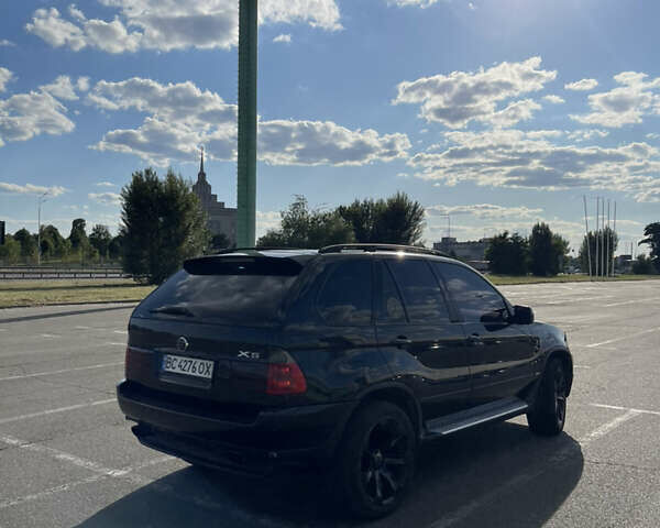 Чорний БМВ Х5, об'ємом двигуна 3 л та пробігом 430 тис. км за 11000 $, фото 6 на Automoto.ua